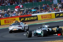 The Mercedes Safety Car leads the cars