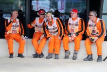 Marshals in the pit lane