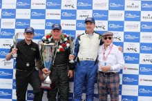 Silverstone Classic 2019Podium, Steve Hartlet and Mike Cantillon with Sir Jackie StewartAt the Home of British Motorsport. 26-28 July 2019Free for editorial use only Photo credit – JEP