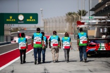 Bahrain marshals in the pit lane