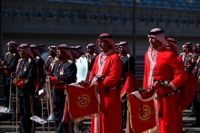 A band perform the Bahrain national anthem