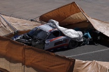 Alexandre Areia Porsche GT3 Cup 991 that crashed into the turn one grandstand