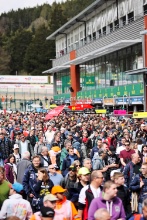 Fans in the pit lane