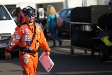 A marshal in the paddock
