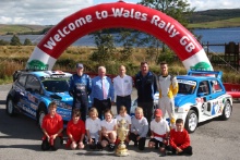 Elfyn Evans (GBR) M-Sport WRC driver, Dilwyn Roberts (GBR) Leader of the Conwy County Borough Council, Ben Taylor (GBR) Managing Director dayinsure Wales Rally GB, Dennis Ryan (GBR) Founder and Chairman Dayinsure, Chris Ingram (GBR) Opel Motorsport Driver and school children