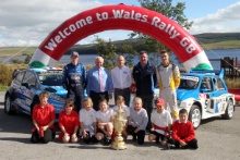 Elfyn Evans (GBR) M-Sport WRC driver, Dilwyn Roberts (GBR) Leader of the Conwy County Borough Council, Ben Taylor (GBR) Managing Director dayinsure Wales Rally GB, Dennis Ryan (GBR) Founder and Chairman Dayinsure, Chris Ingram (GBR) Opel Motorsport Driver and school children