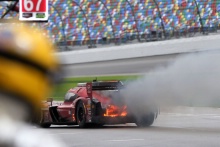Tristan Nunez / Jonathan Bomarito / Spencer Pigot Mazda Motorsports Mazda DPi on fire