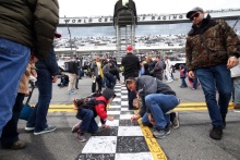 Fans at the Daytona 24 hours - signing the track before the race