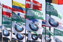 Rolex and BMW flags